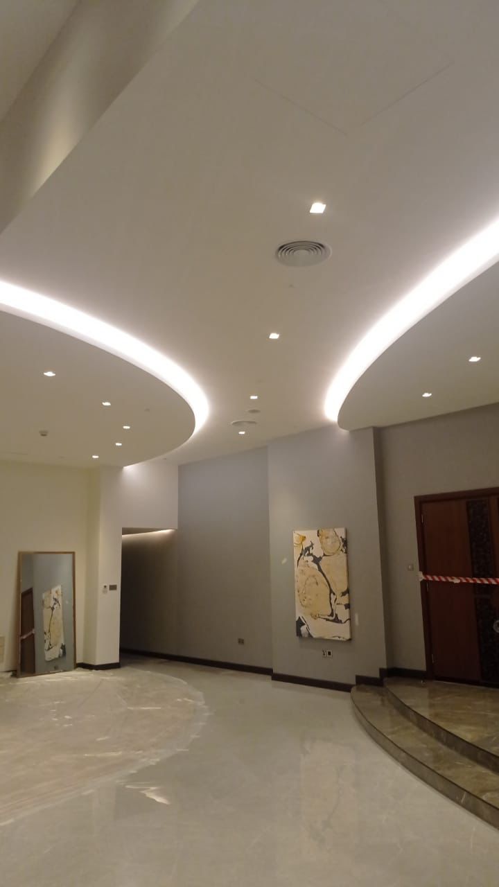 Finished lobby corridor with cove lighting at Rixos Premium, Jumeirah Beach Residence